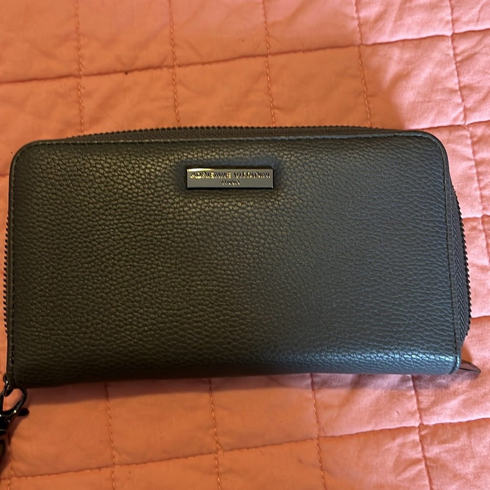 Adrienne Vittadini wristlet/wallet in new condition. Never used dark taupe color